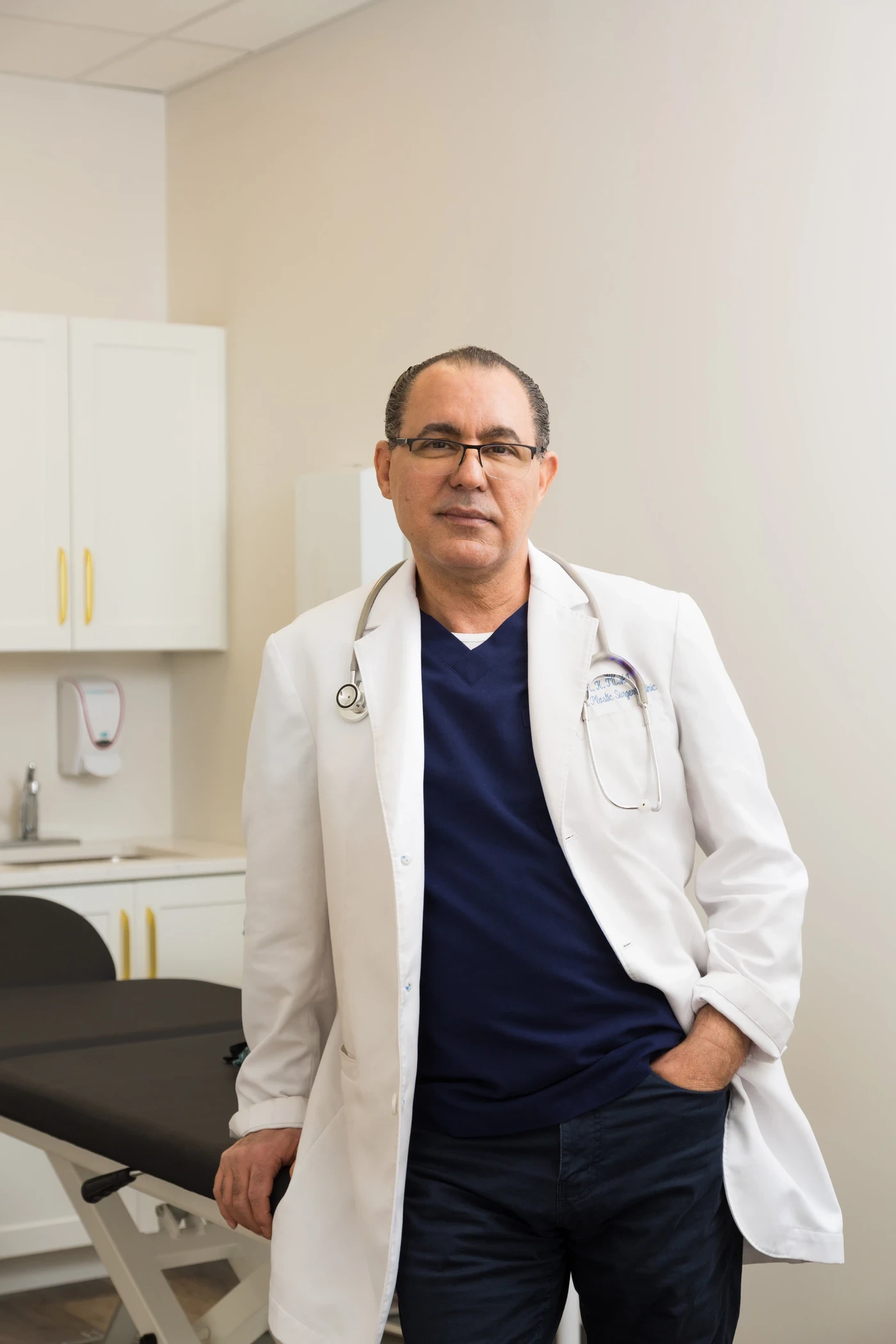 Dr. Kamal Tumi, M.D., F.R.C.S.(C), Plastic Surgeon